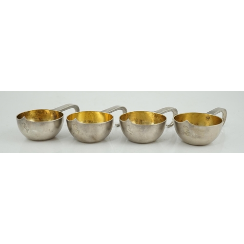 438 - A set of four late 19th century Russian 84 zolotnik silver kovsh cups, with engraved initials, unkno... 