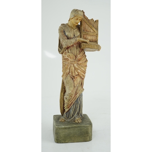 45 - A Compton tempera painted pottery figure of St Cecilia, early 20th century, impressed factory mark t... 