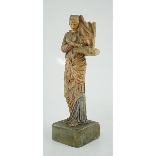 45 - A Compton tempera painted pottery figure of St Cecilia, early 20th century, impressed factory mark t... 