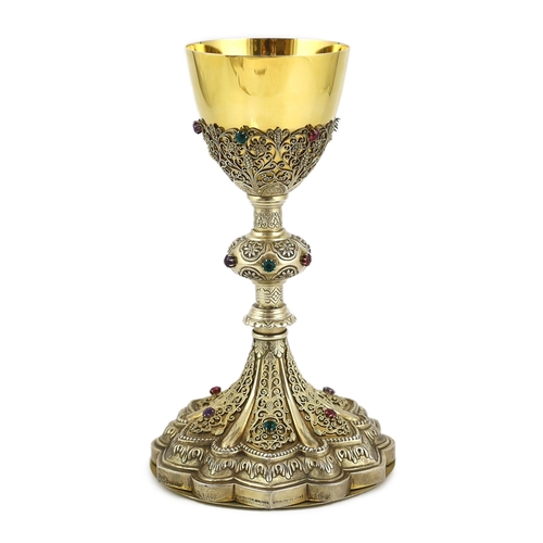 464 - A late 19th/early 20th century American Eucharistic 14kt gold, silver gilt and multi coloured paste ... 