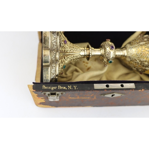 464 - A late 19th/early 20th century American Eucharistic 14kt gold, silver gilt and multi coloured paste ... 