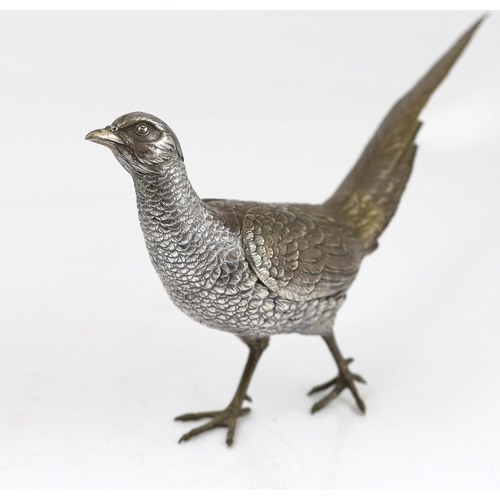 467 - A large pair of German 800 standard silver free standing model pheasants with articulated wings, c.1... 