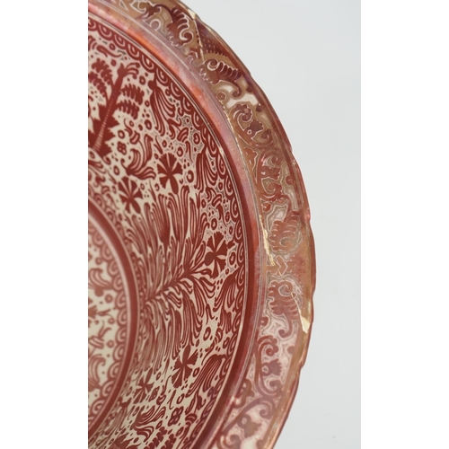 47 - Ulisse Cantagalli, a large Hispano-Moresque style ruby-copper lustre basin, c.1900, decorated with s... 