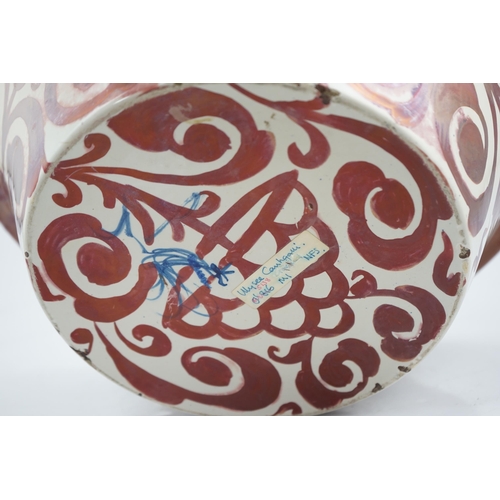 47 - Ulisse Cantagalli, a large Hispano-Moresque style ruby-copper lustre basin, c.1900, decorated with s... 