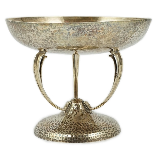 470 - A George V Arts & Crafts planished silver tazza, by Pearce & Sons, on curved tripod supports and pla... 