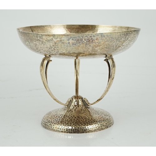 470 - A George V Arts & Crafts planished silver tazza, by Pearce & Sons, on curved tripod supports and pla... 