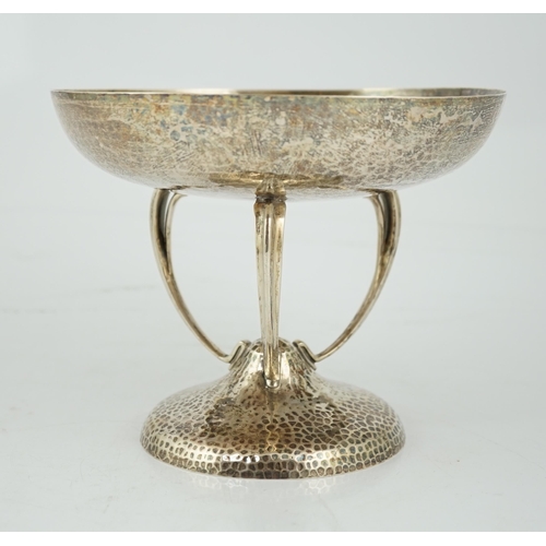 470 - A George V Arts & Crafts planished silver tazza, by Pearce & Sons, on curved tripod supports and pla... 