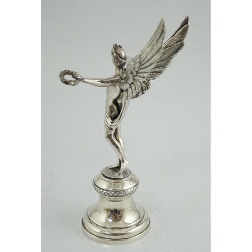 472 - A George V silver presentation swimming trophy, 'The Rose Viner Trophy', by Viners Ltd, modelled as ... 