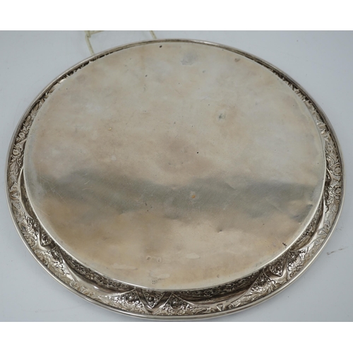 473 - A George V silver circular tray, by Walker & Hall, with raised curl over border and engraved decorat... 