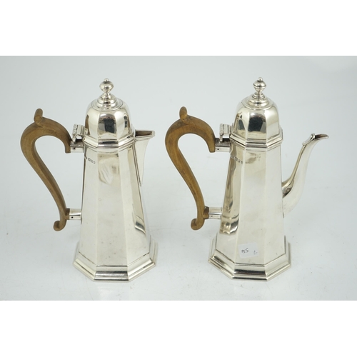 474 - A George V 18th century style silver cafe au lait pair by Garrard & Co, London, 1923 & 1926, height ... 