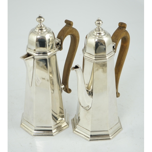 474 - A George V 18th century style silver cafe au lait pair by Garrard & Co, London, 1923 & 1926, height ... 