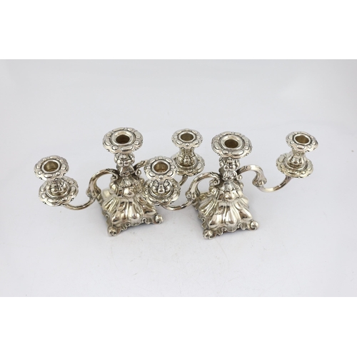 475 - A pair of 1940's Danish silver two branch, three light dwarf candelabra, by Hans Jensen & Co, with s... 