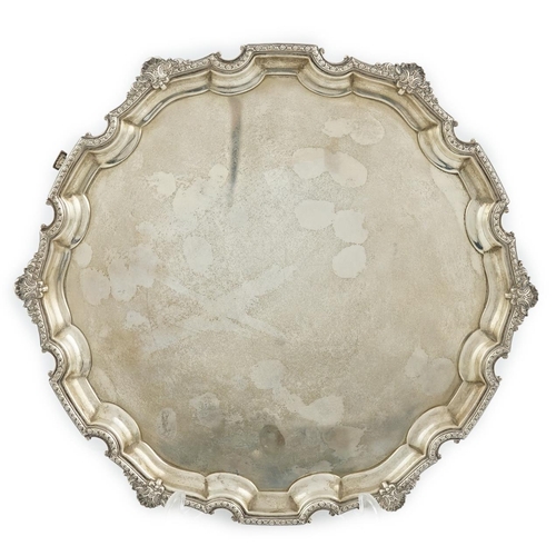 476 - A George VI silver salver, by A.E. Poston & Co Ltd, with pie crust foliate border, the base engraved... 