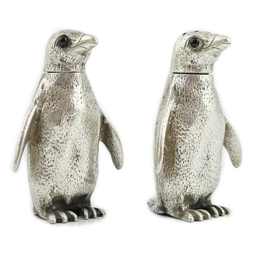 480 - A pair of Elizabeth II silver novelty condiments, modelled as penguins, William Comyns & Sons Ltd, w... 