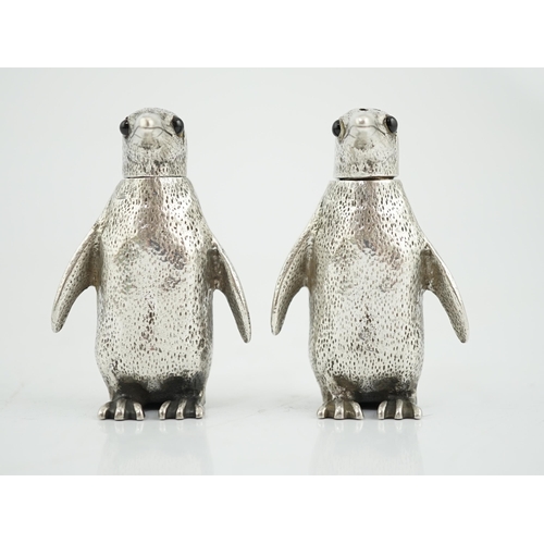 480 - A pair of Elizabeth II silver novelty condiments, modelled as penguins, William Comyns & Sons Ltd, w... 