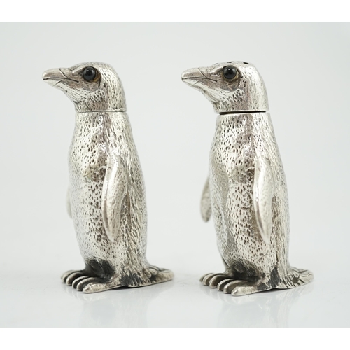 480 - A pair of Elizabeth II silver novelty condiments, modelled as penguins, William Comyns & Sons Ltd, w... 