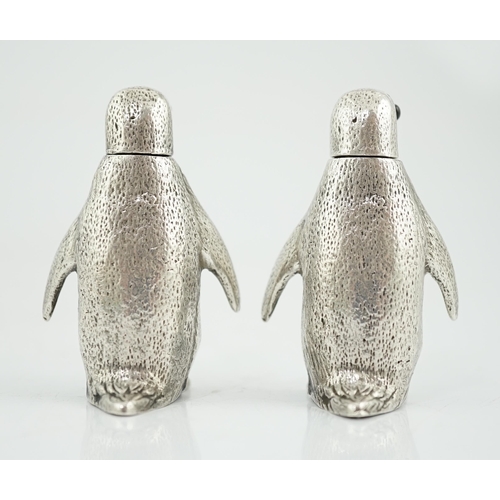 480 - A pair of Elizabeth II silver novelty condiments, modelled as penguins, William Comyns & Sons Ltd, w... 