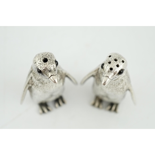 480 - A pair of Elizabeth II silver novelty condiments, modelled as penguins, William Comyns & Sons Ltd, w... 