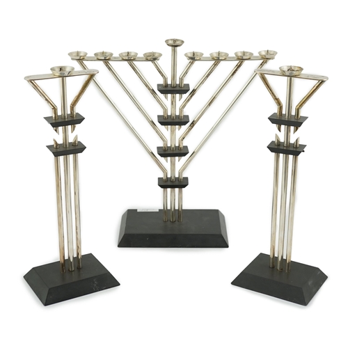 481 - An Elizabeth II silver mounted slate Hanukkah Menorah and a pair of matching candlesticks by Mariann... 