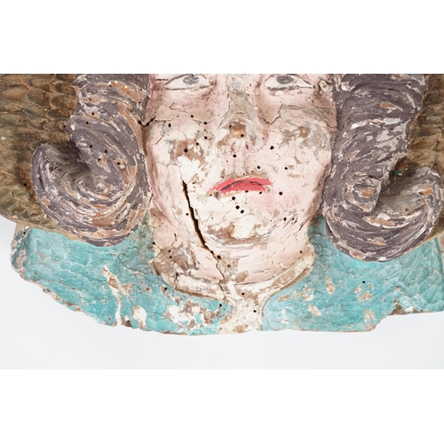 5 - A 16th century French carved and painted wooden angel mask corbel, thought to have originated from L... 