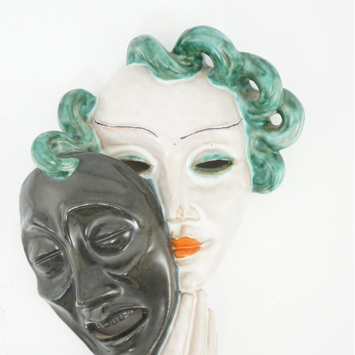 50 - An Art Deco tin-glazed terracotta theatrical wall mask, by Goldscheider, black printed mark Goldsch... 
