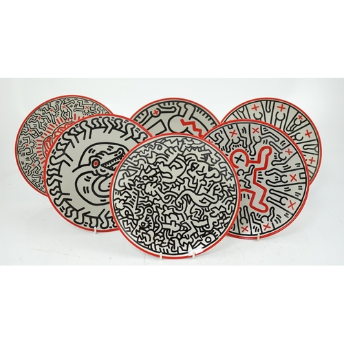 54 - Keith Haring (American, 1958-1990) designs, a set of six Ligne Blanche, Limoges porcelain plates, pr... 