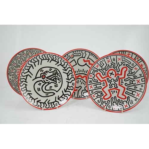 54 - Keith Haring (American, 1958-1990) designs, a set of six Ligne Blanche, Limoges porcelain plates, pr... 