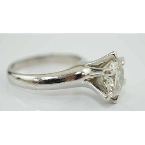 595 - A modern platinum and solitaire diamond set ring, the round brilliant cut stone weighing approximate... 