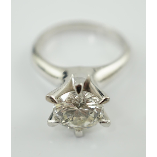 595 - A modern platinum and solitaire diamond set ring, the round brilliant cut stone weighing approximate... 