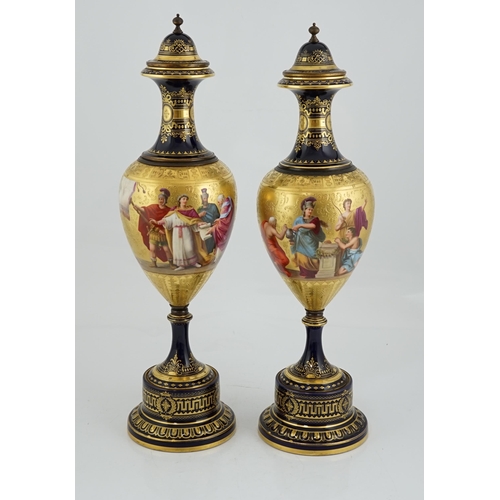 60 - A pair of tall Vienna style porcelain vases and covers, early 20th century, each painted by B.Herb, ... 