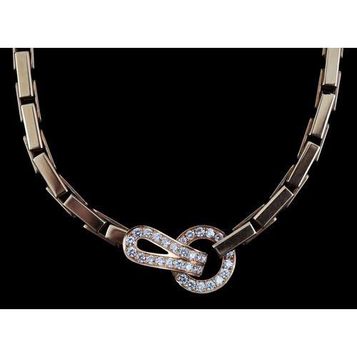 600 - A modern Cartier 18ct gold necklace, with diamond cluster set clasp, signed and numbered 952342, 38c... 