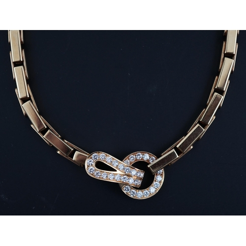 600 - A modern Cartier 18ct gold necklace, with diamond cluster set clasp, signed and numbered 952342, 38c... 