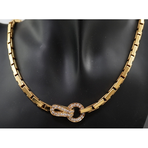 600 - A modern Cartier 18ct gold necklace, with diamond cluster set clasp, signed and numbered 952342, 38c... 