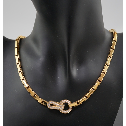 600 - A modern Cartier 18ct gold necklace, with diamond cluster set clasp, signed and numbered 952342, 38c... 