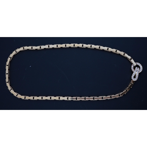 600 - A modern Cartier 18ct gold necklace, with diamond cluster set clasp, signed and numbered 952342, 38c... 