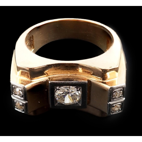 601 - A 1940's 18ct gold and four stone diamond set 'tank' dress ring, the central round brilliant cut sto... 