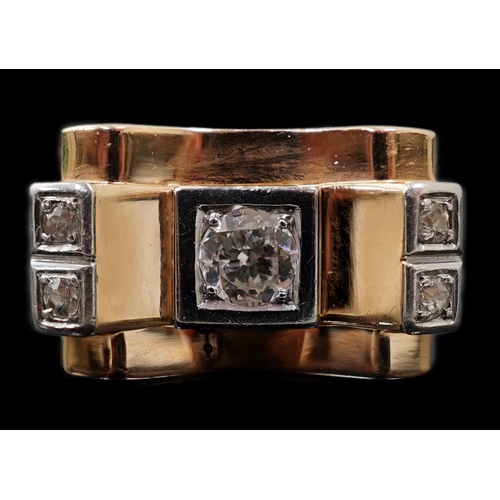 601 - A 1940's 18ct gold and four stone diamond set 'tank' dress ring, the central round brilliant cut sto... 