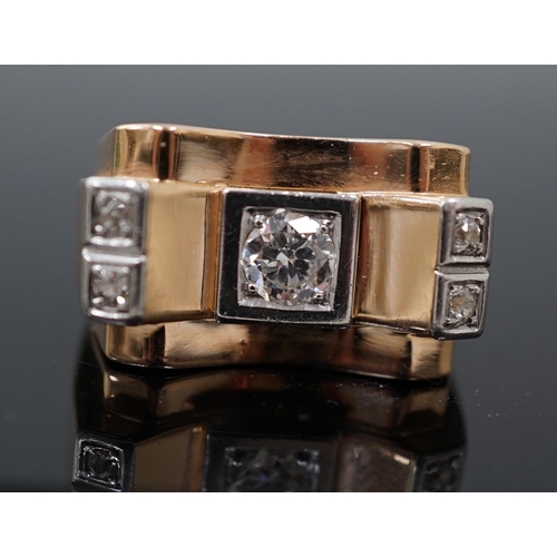 601 - A 1940's 18ct gold and four stone diamond set 'tank' dress ring, the central round brilliant cut sto... 