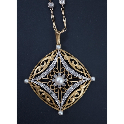 606 - A French Belle Epoque pierced 18k gold, seed pearl and rose cut diamond set pendant, on a French 18k... 