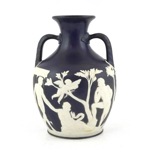 61 - A Wedgwood dark blue glazed and white sprigged replica of the  Portland vase, late 19th century, imp... 