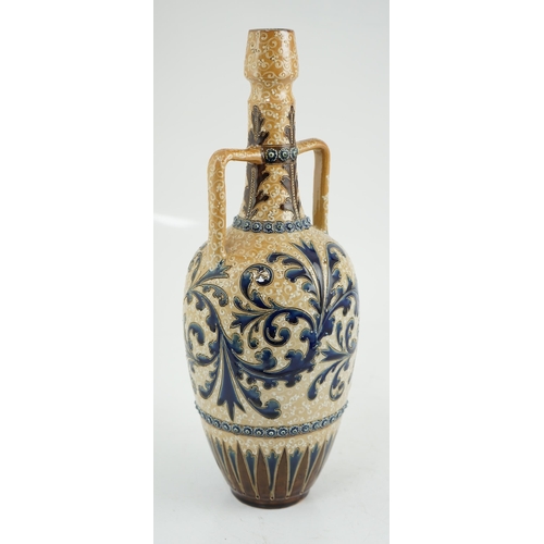 63 - George Tinworth for Doulton Lambeth, a large stoneware vase with scrolling blue foliate decoration, ... 