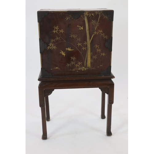67 - A Japanese Meiji period lacquered table cabinet, Meiji period, decorated with cockerels, peacocks, f... 