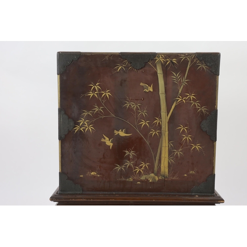 67 - A Japanese Meiji period lacquered table cabinet, Meiji period, decorated with cockerels, peacocks, f... 