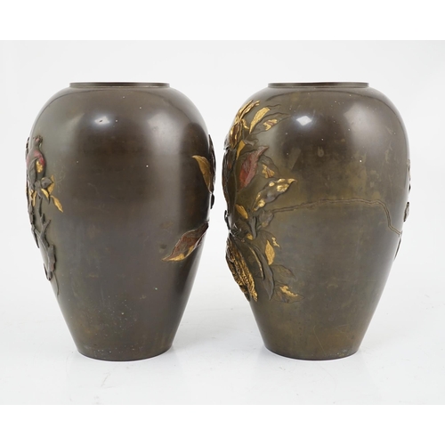 68 - A pair of Japanese bronze and mixed metal ovoid vases, Meiji period, one cast in relief and picked o... 