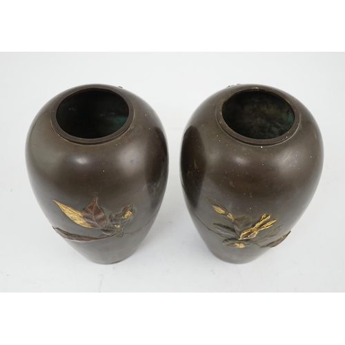 68 - A pair of Japanese bronze and mixed metal ovoid vases, Meiji period, one cast in relief and picked o... 