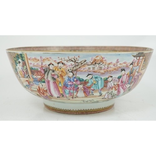 73 - A large Chinese famille rose punch bowl, Qianlong period, the interior painted with fruit and peonie... 