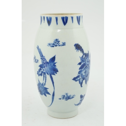 75 - A Chinese Transitional blue and white jar, c.1640, finely painted with four flower sprays, with inci... 