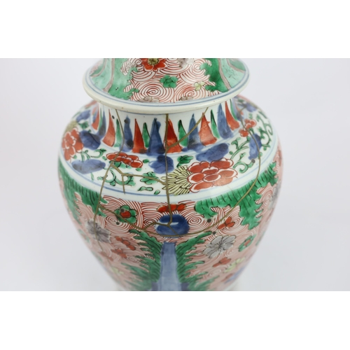 80 - A Chinese wucai ovoid vase and cover, Transitional, Shunzhi period, painted with auspicious objects ... 