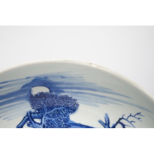 81 - A large Chinese blue and white mythical beasts saucer dish, Yongzheng period, the centre painted w... 