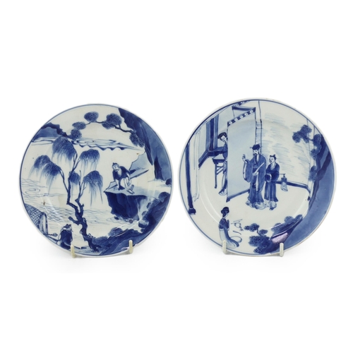 83 - A pair of Chinese blue and white small plates, Kangxi period, the first painted with figures in an i... 